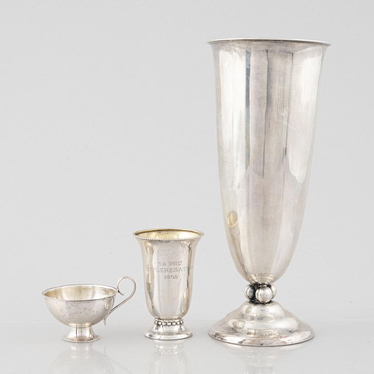 Two silver vases and a punch cup, one by W.A. Bolin, Stockholm 1929.