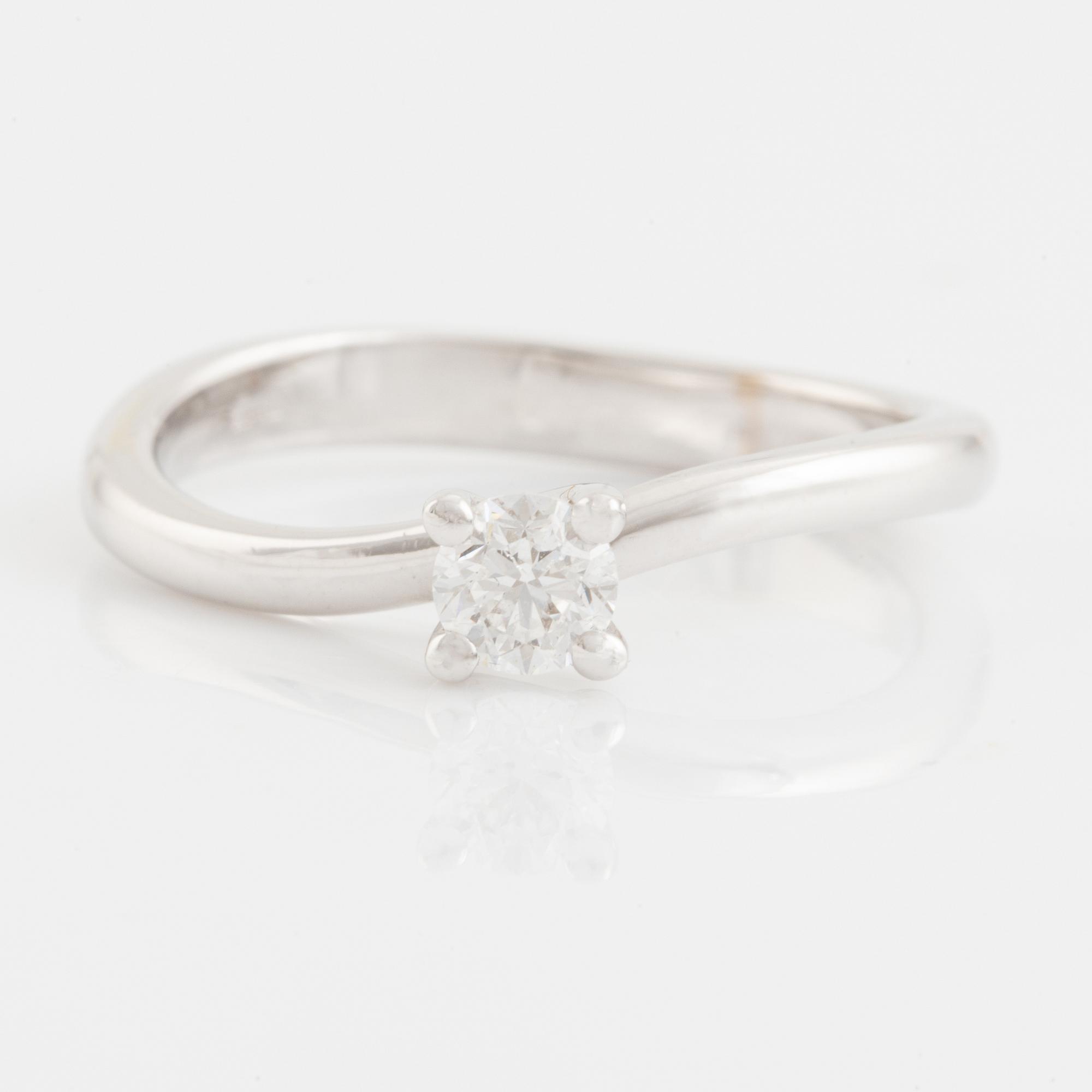 Brilliant cut diamond solitaire ring.