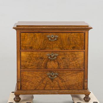 A chest of drawers around year 1900,