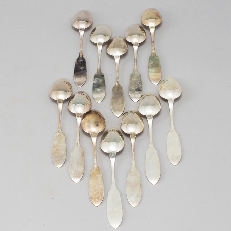 a lot of 24 silver spoons by C O Persson AB in Haparanda, Sweden. Weight ca 522 grams.