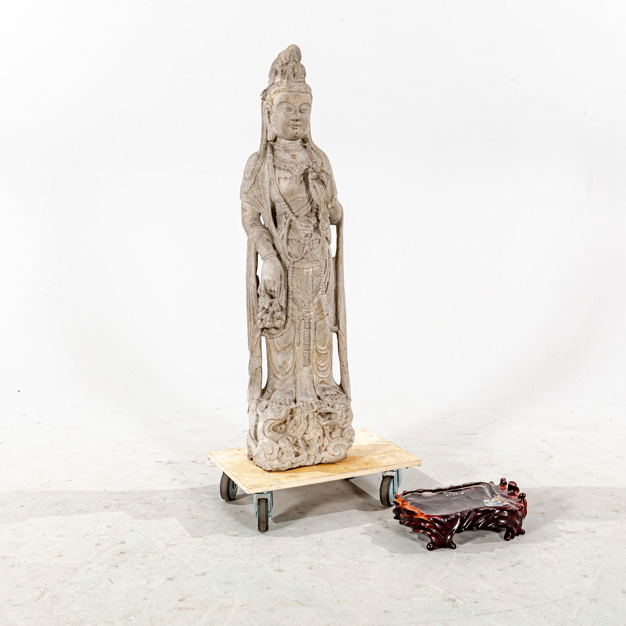 A stone sculpture of Boddhisattva, 20th Century.