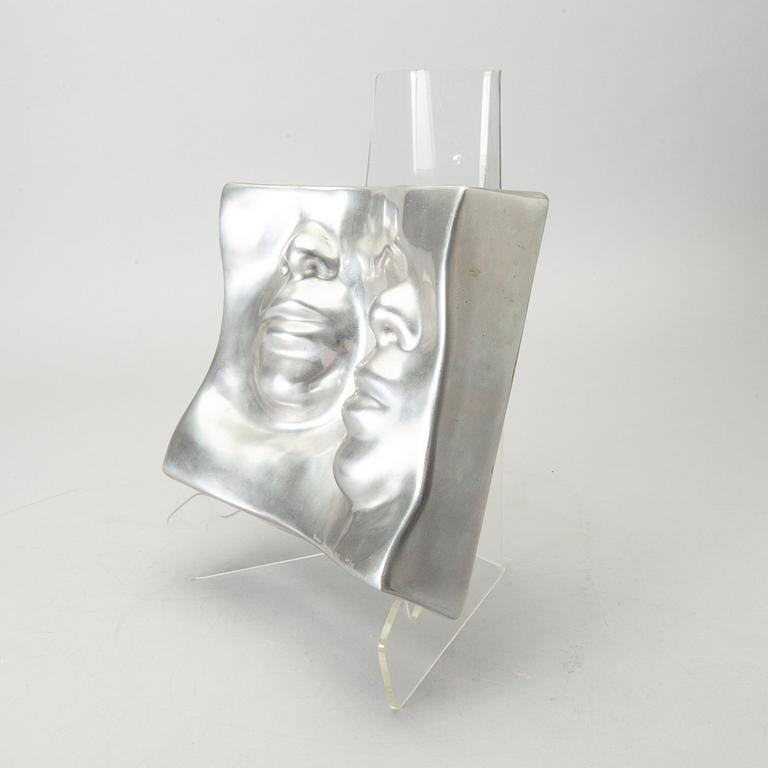 An Barbro Bäckström relief in aluminium. Signed and dated 60/75 1972.