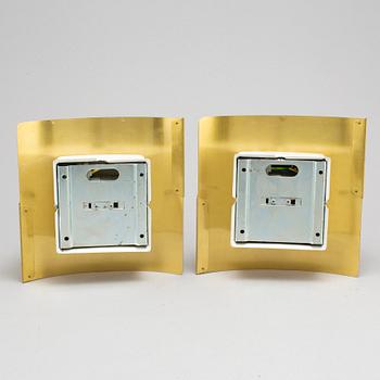 A pair of "Band" wall lamps by Peter Celsing for Falkenbergs belysning.