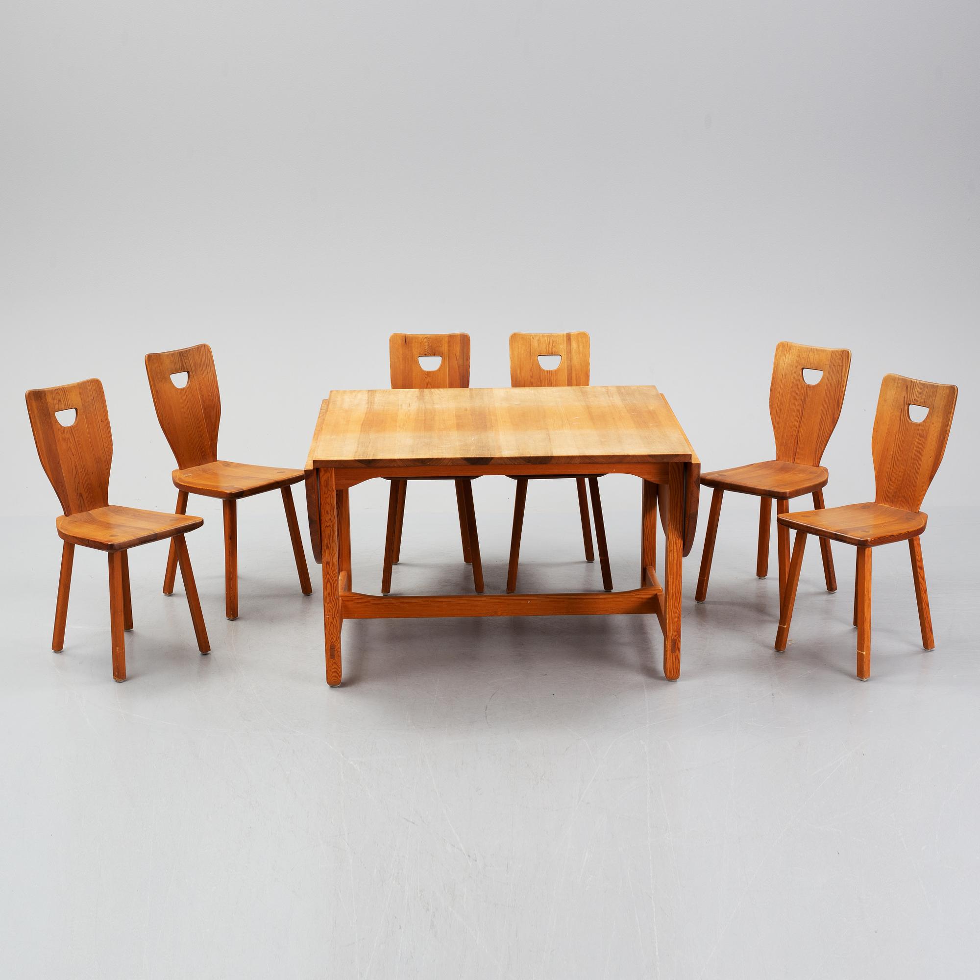 Carl Malmsten, a pine dining table and 6 chairs.