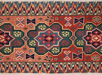 A BENCH CUSHION probably, A FRAGMENT, double-interlocked tapestry, ca 58,5-59,5 x 220-223 cm, Scania (Sweden).