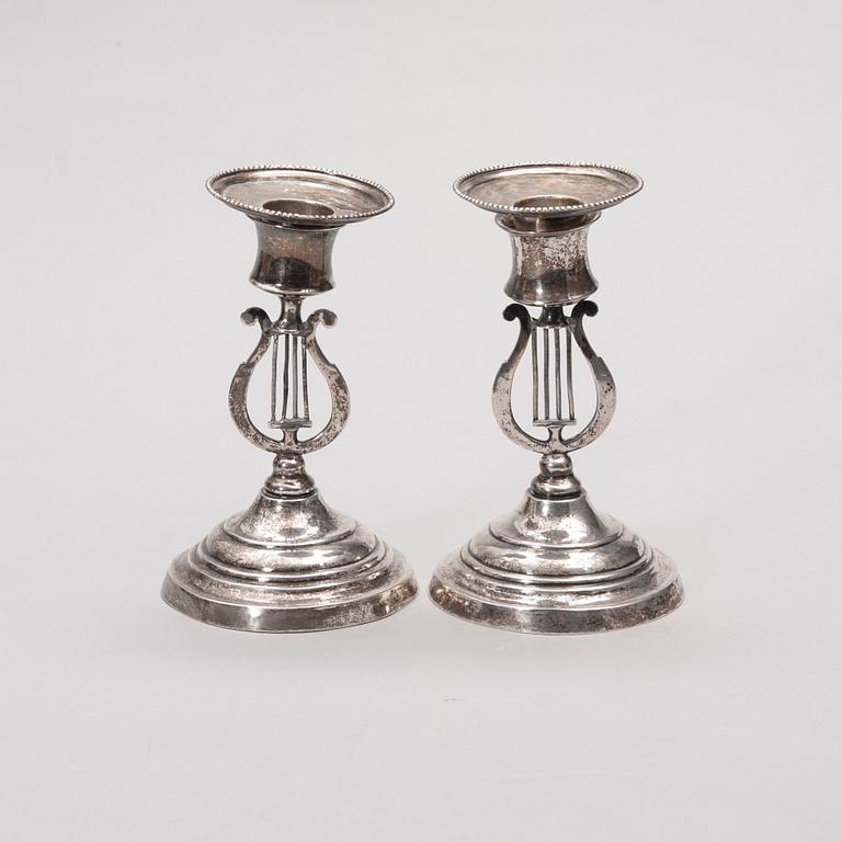 LJUSSTAKAR, ett par, silver, Jafet Knuuttinen (1857-1898), Kuopio 1860. Vikt 162,8 g.