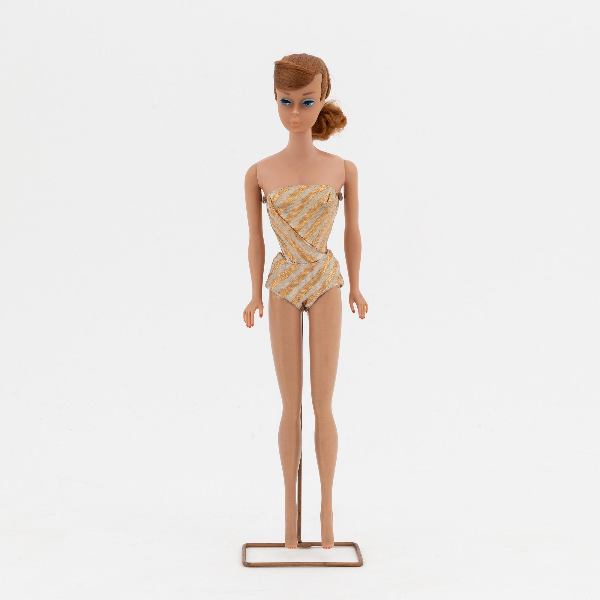 A 1960's 'Titian swirl ponytail' barbie with clothes and accessories, Mattel 1960's.