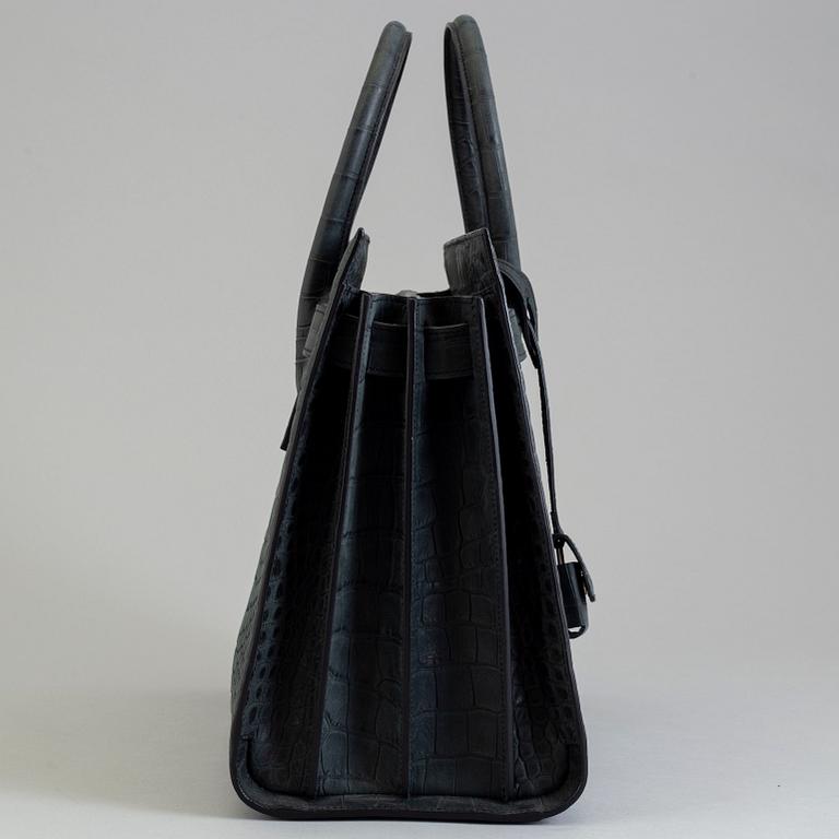 A bag by Yves Saint Laurent, "Sac du jour".