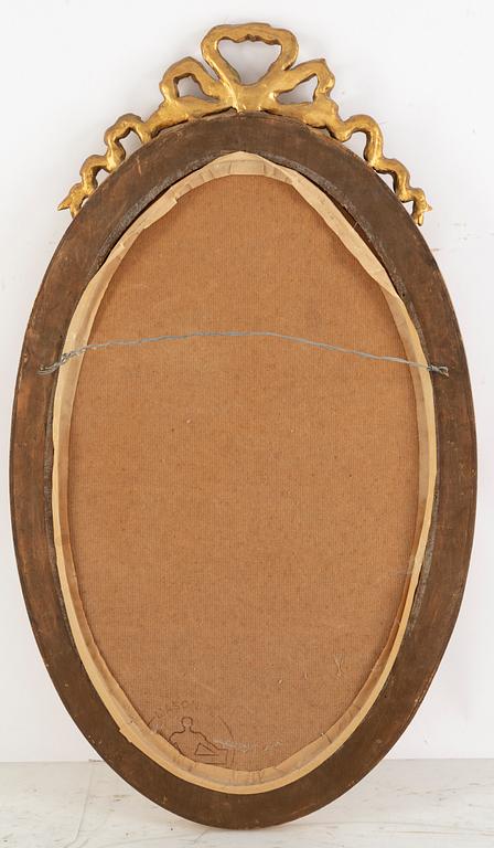A Gustavian style mirror, mid 20th Century.