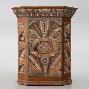 A Swedish provincial corner cabinet, dated 1794.