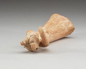 A potted figure of a dancer, Tang dynasty (618-907).