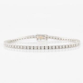 Tennis bracelet 18K white gold with round brilliant-cut diamonds.