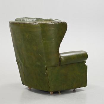 ÖRONLAPPSFÅTÖLJ, skinn, 1900-tal.