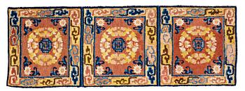 282. A MEDITATION RUG, three squares, an antique Ningxia, China, the Qing dynasty, ca 166 x 58,5 cm.