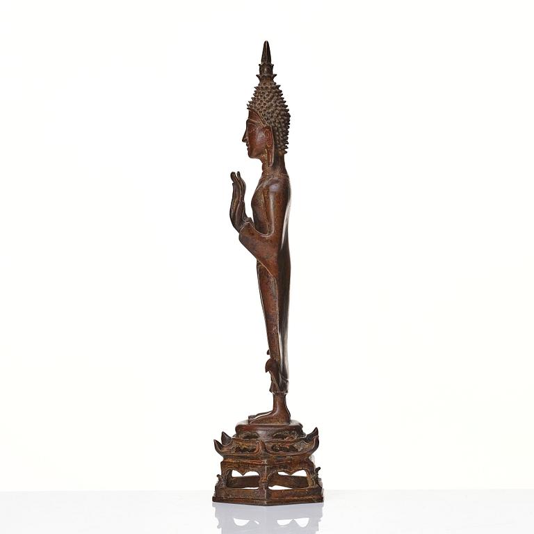 A standing sculpture of buddha, Laos, 18th Century.
