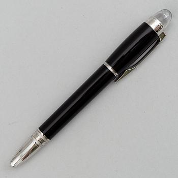 MOntblanc, a ball point pen and leather passport holder.