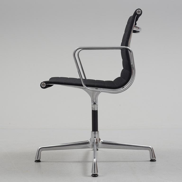 A 'EA 104 Swivel' armchair by Charles & Ray Eames, Vitra, 2016.