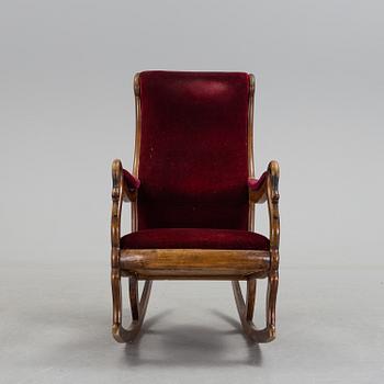 A 19th century swan arm rocking chair.