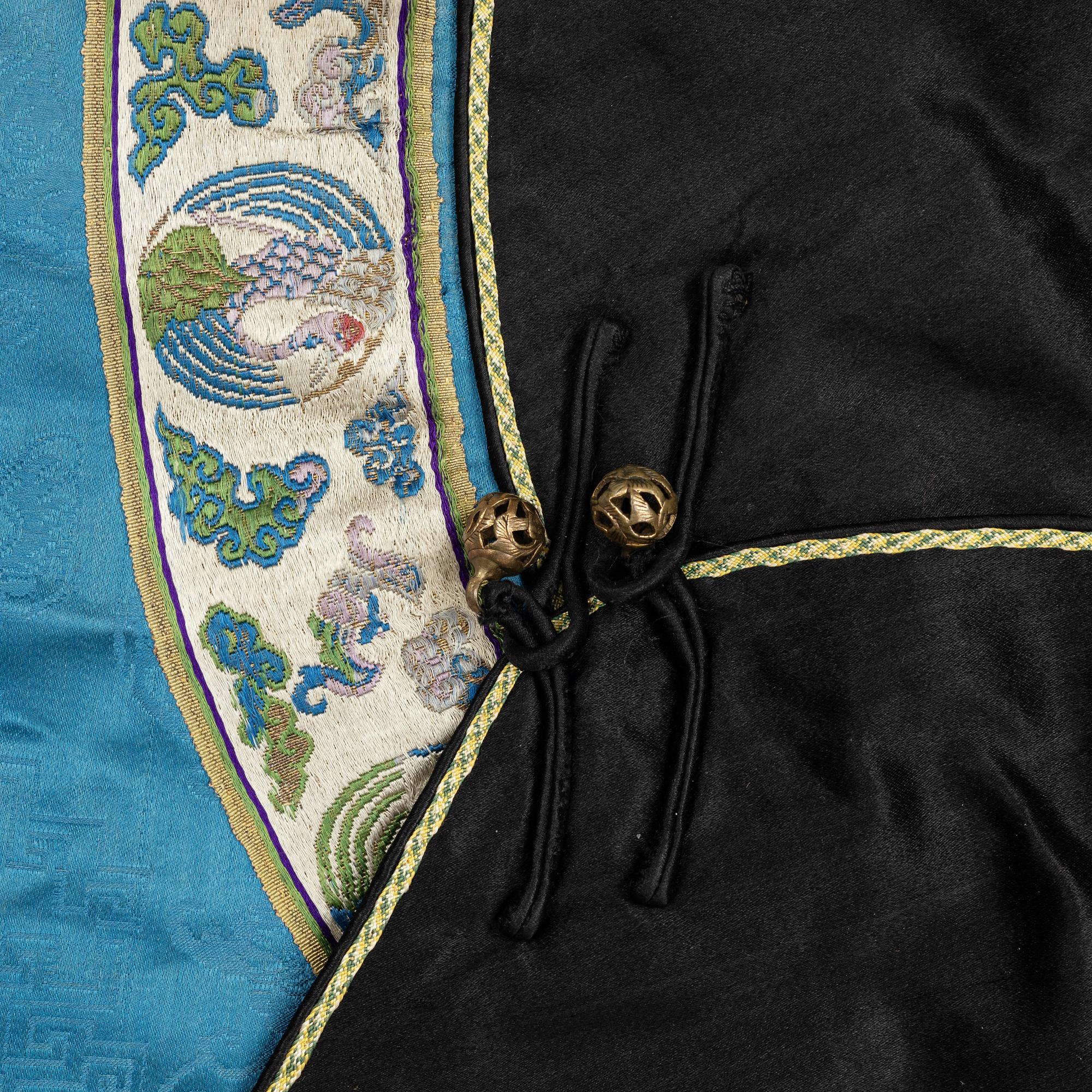 A female silk robe/over coat for winter, Qing dynasty, 19th century.