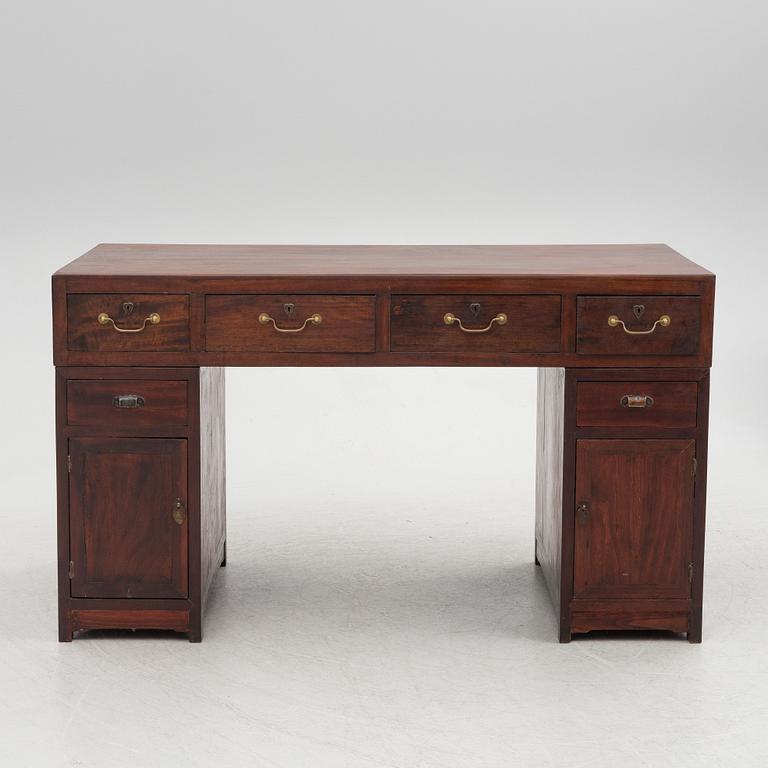 A Chinese hardwood desk, 20th century.