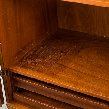 A cabinet veneered with teak designed by Kirke Nielsen for Abrahamssons Möbelfabrik in Smålands Taberg, 1950´s.