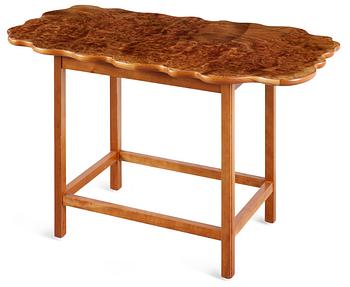 482. A Josef Frank burrwood and cherry table, Svenskt Tenn, model 1058.