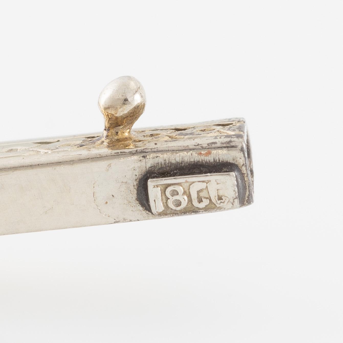 Bracelet, 18K white gold set with brilliant-cut and octagonal-cut diamonds and blue sapphires, Art Deco, circa 1920-30s.