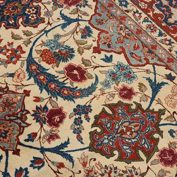 A old Esfahan carpet, around 299 x 210 cm.