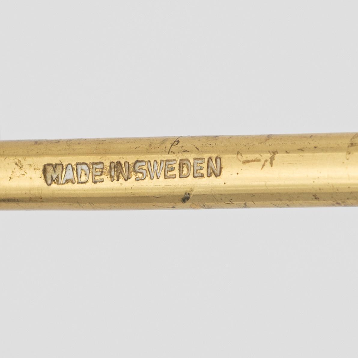 A Swedish brass candelabrum, second half of the 20th Century.
