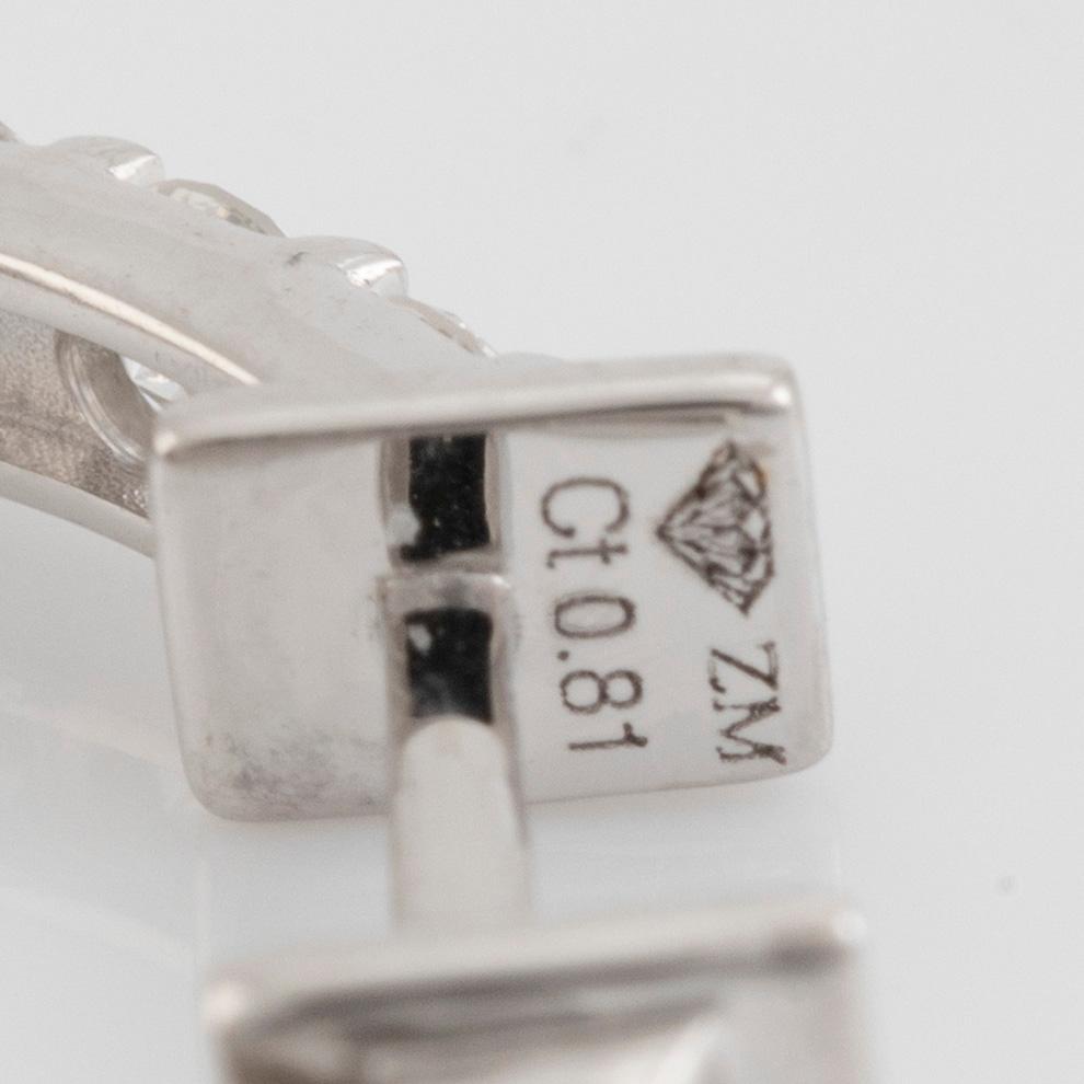 Brilliant cut diamond hopp earrings.