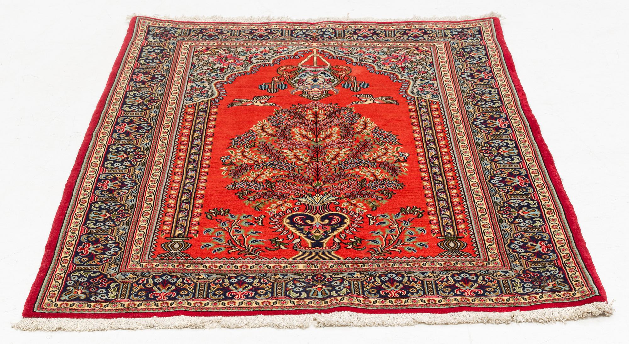 A Quum rug, ca 152 x 106 cm.