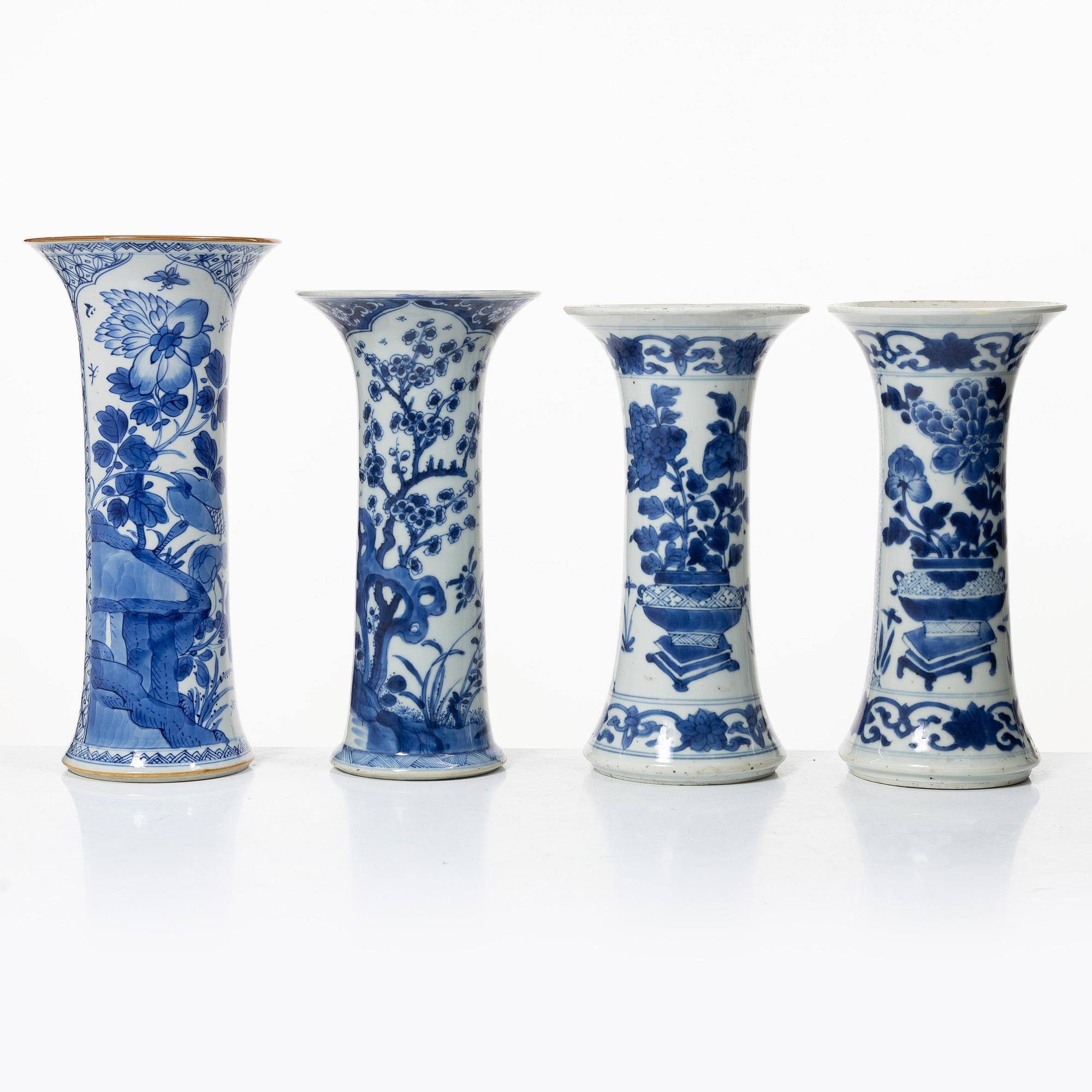 Four blue and white trumpet vases, Qing dynasty, Kangxi (1662-1722).