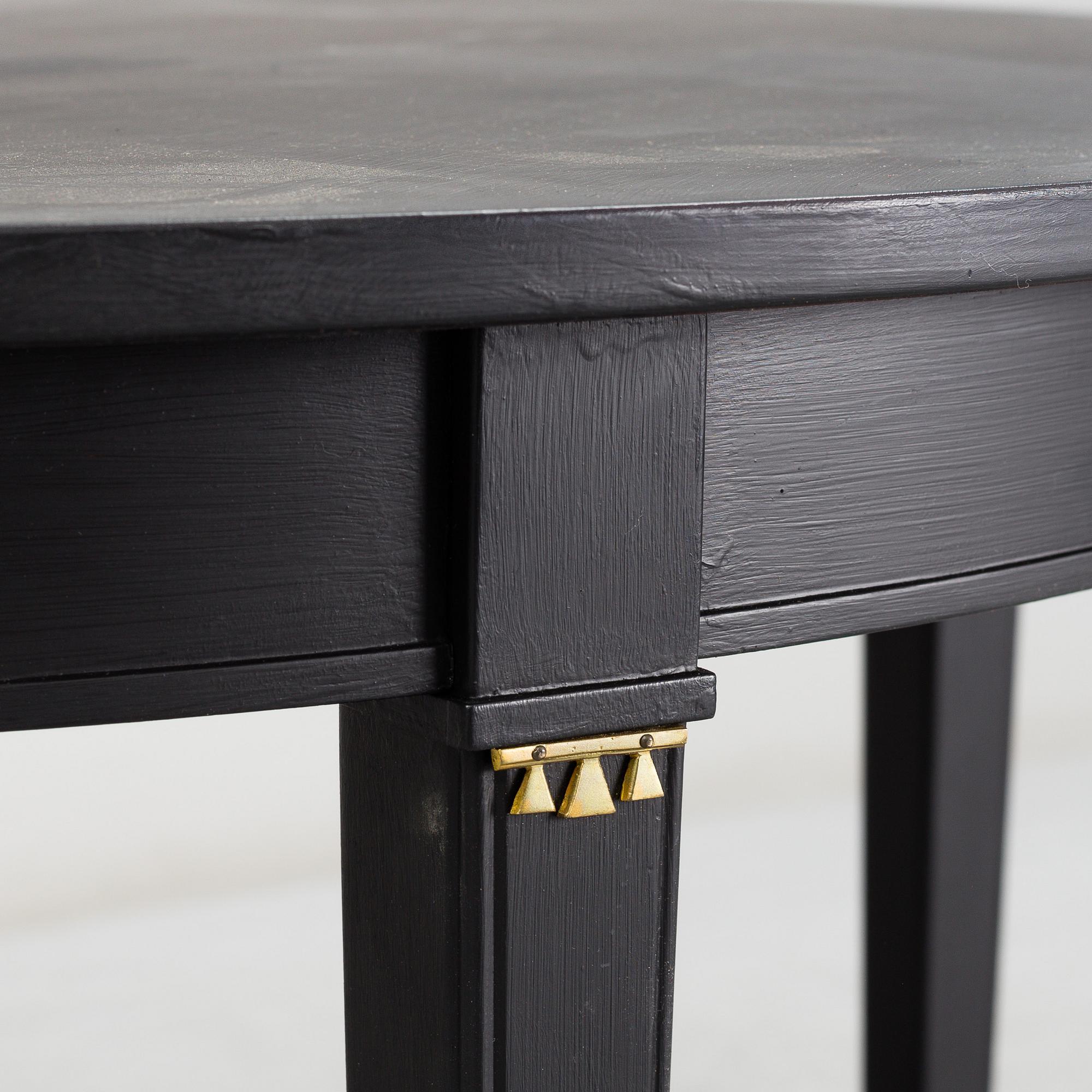 A Gustavian style painted dining table, second half of the 20th century.