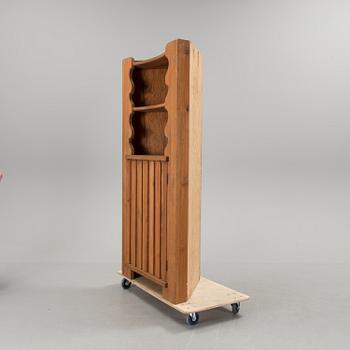 A corner cabinet by Axel Einar Hjorth.