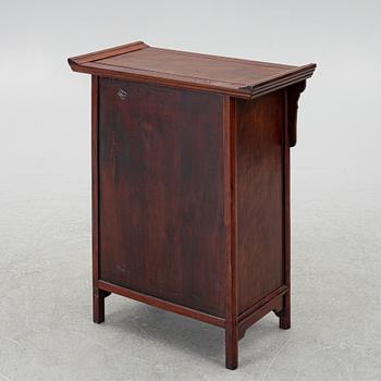 A small Chinese wooden cabinet, 1900s.