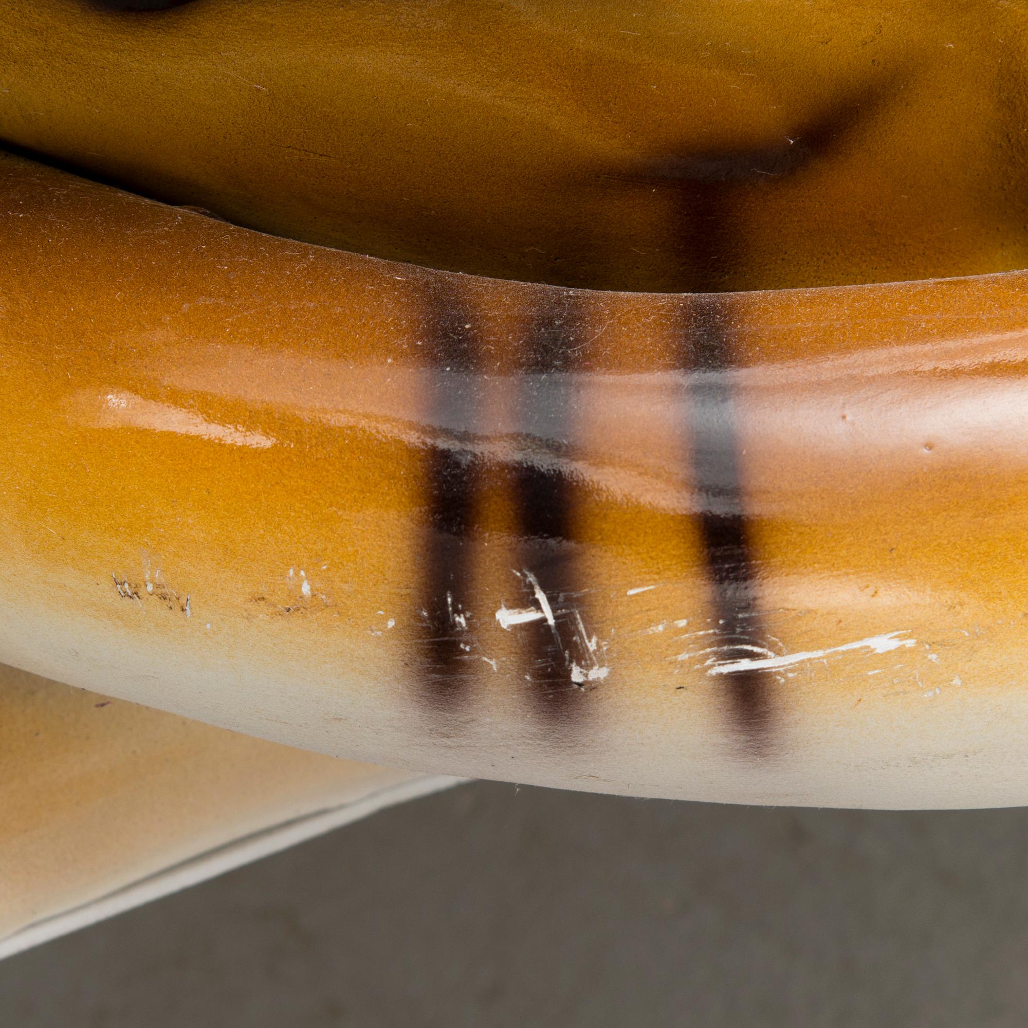 A ceramic tiger statue from the latter half of the 20th Century.