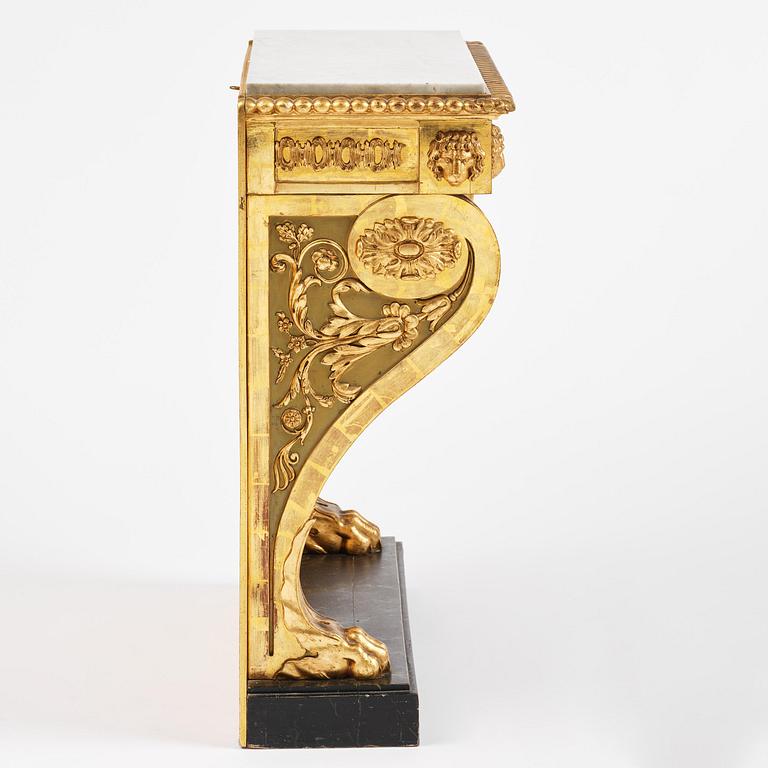 An Empire giltwood and gesso console table by P.G. Bylander (master in Gothenburg 1811-58).