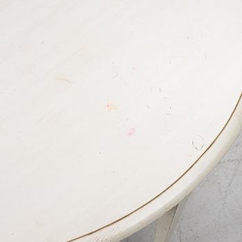 A Gustavian style dining table, late 20th Century.