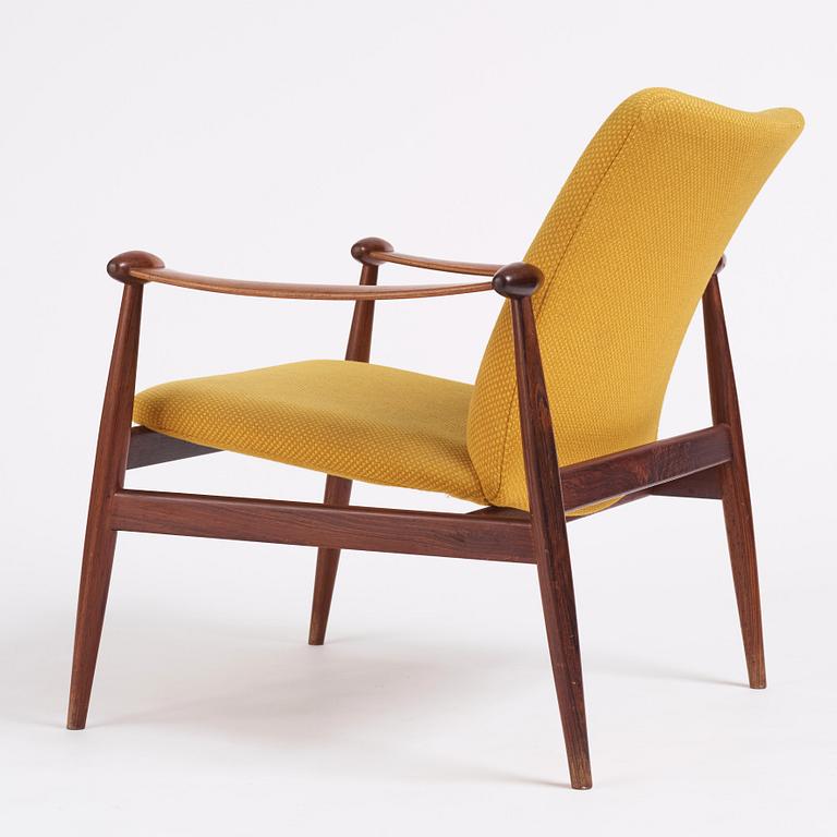 Finn Juhl, a 'model F-133' rosewood easy chair by France & Son, Denmark 1960s.