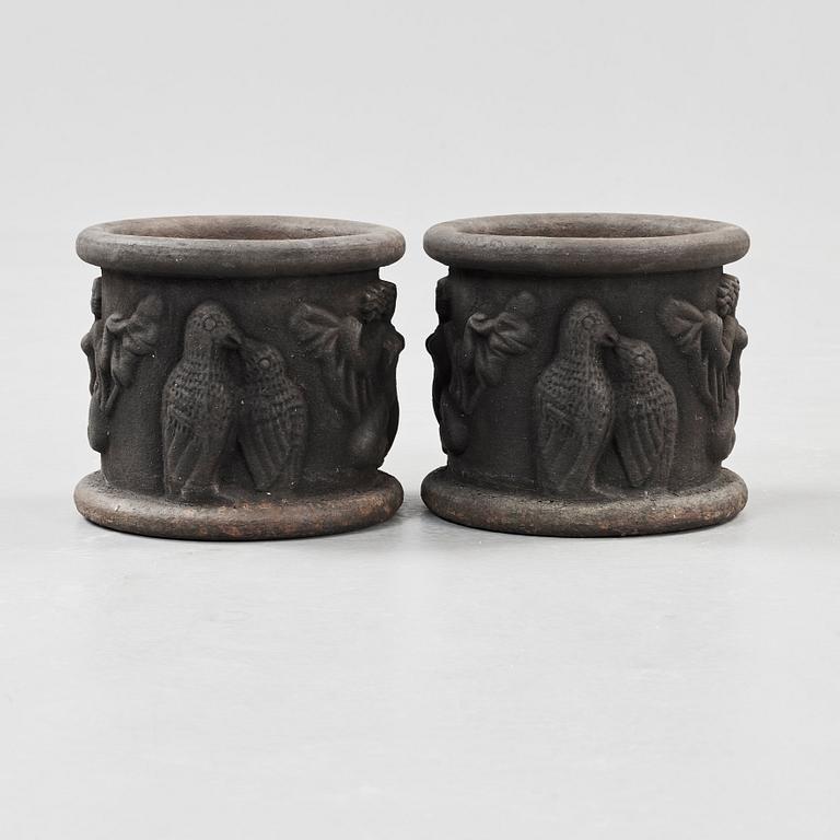 A pair of Anna Petrus cast iron jardinières, Näfveqvarn, Sweden.