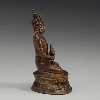 A gilt copper alloy figure of Amitayus, Tibet, 15th Century.