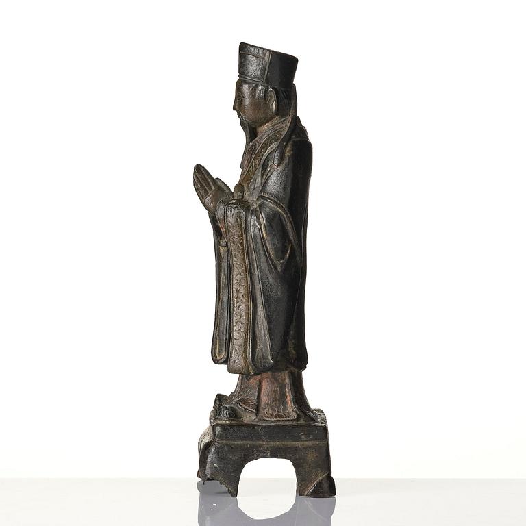A bronze sculpture of a daoist immortal, Ming dynasty (1368-1644).