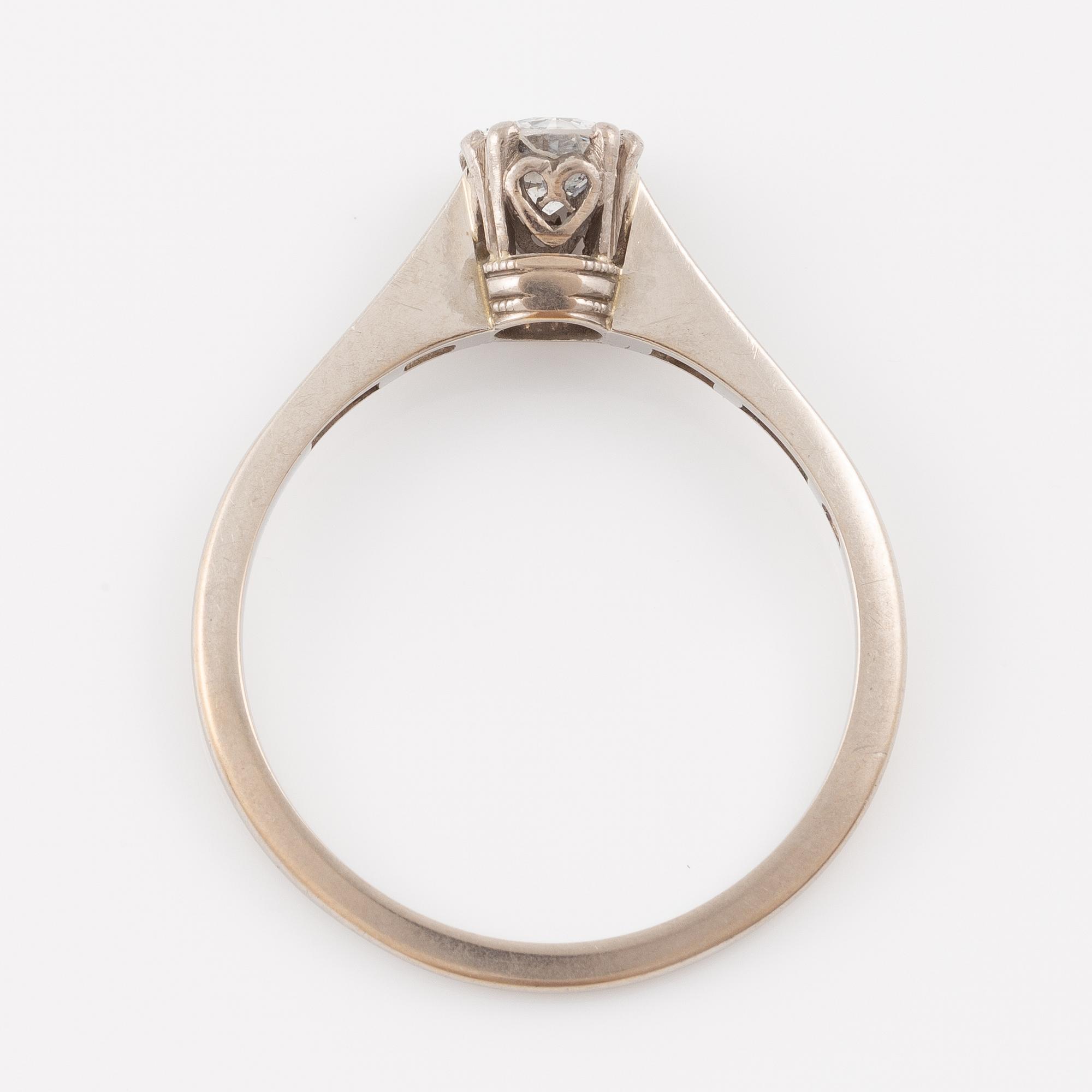 Ring, 18K white gold with a brilliant-cut diamond.