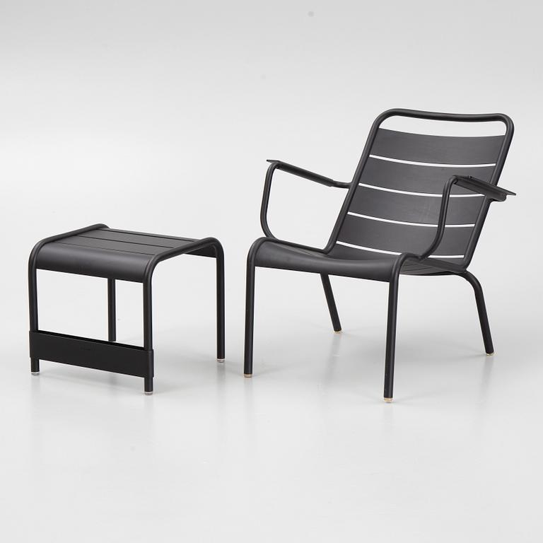 A 'Luxembourg' lounge chair and a foot stool, Fermob.