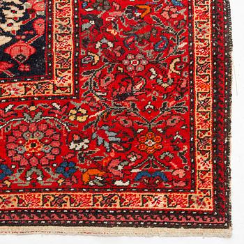 A Farahan carpet, c. 520 x 205 cm.