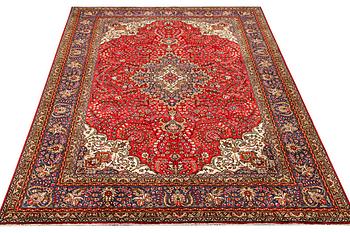 A Tabriz carpet, c 295 x 198 cm.