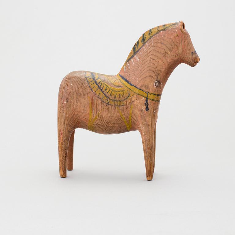 A painted folk art dala horse late 19th century.