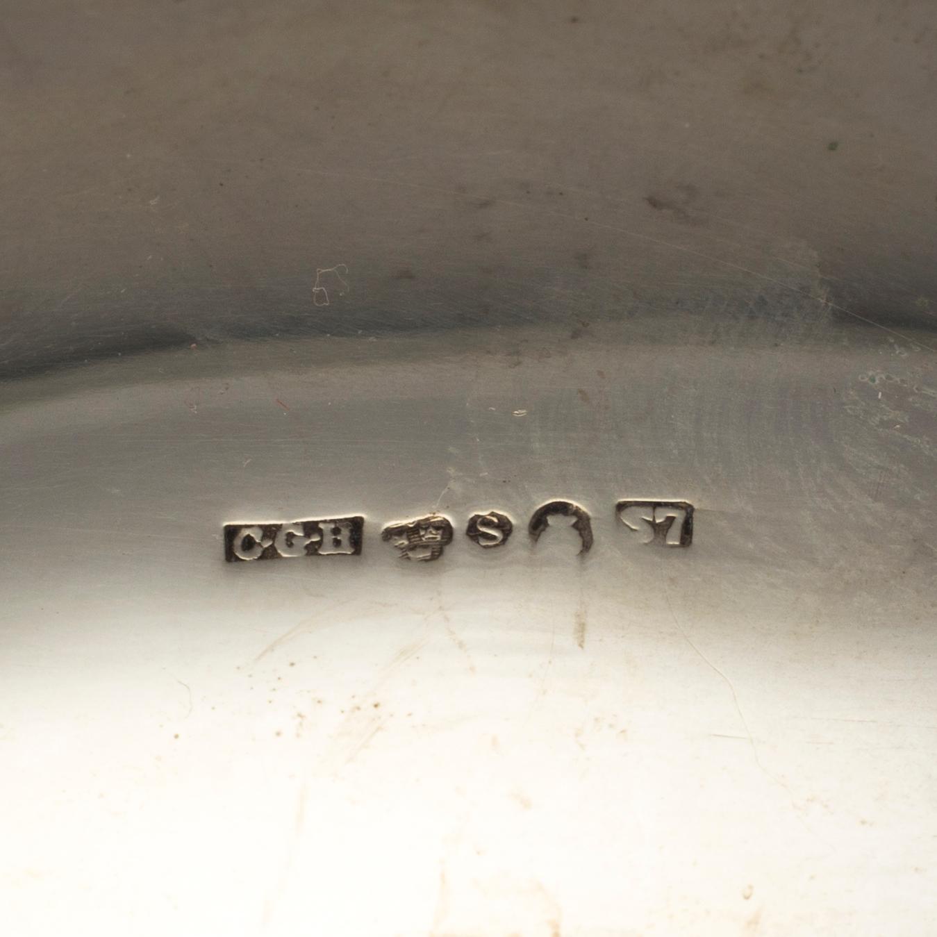 silver coffee pot with ivory handle and sugar bowl by CG Hallberg, Stockholm 1981 and 1920. Weight ca 1681 grams.