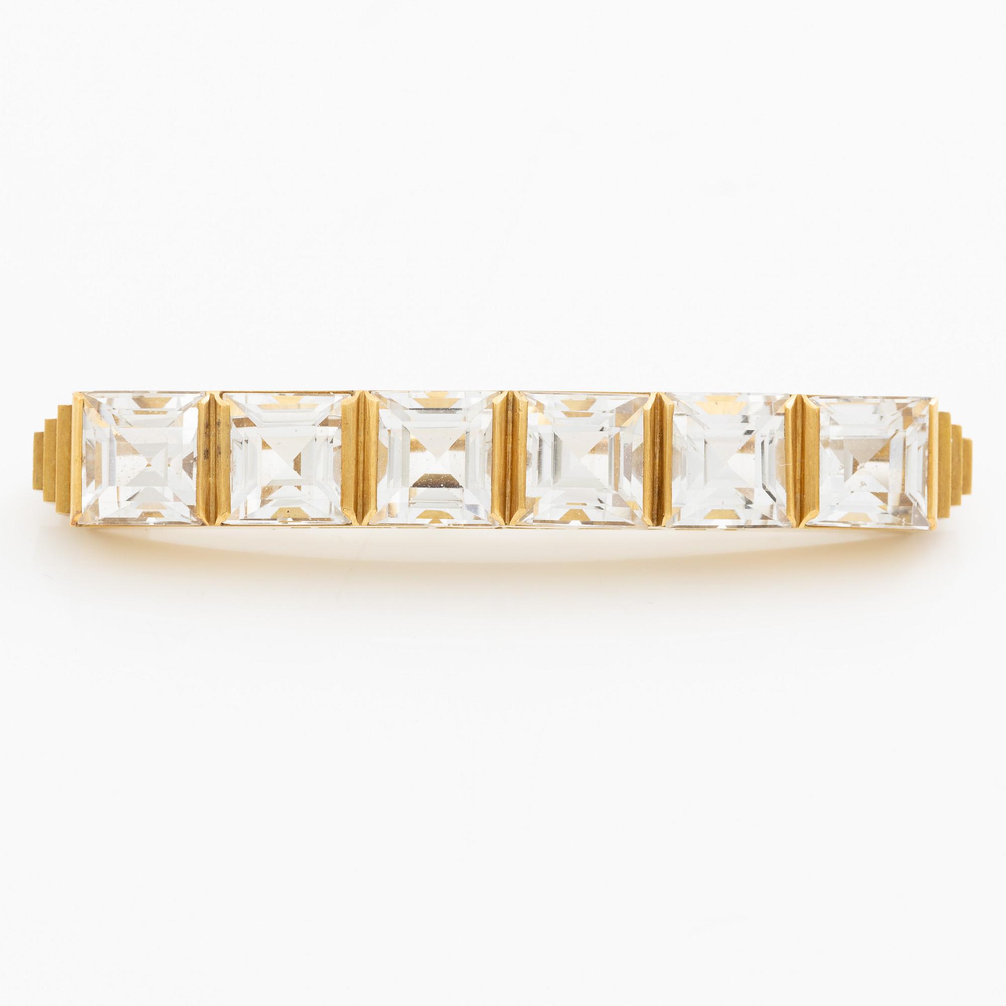 Wiwen Nilsson, a brooch, 18K gold with faceted rock crystal, Lund 1942.
