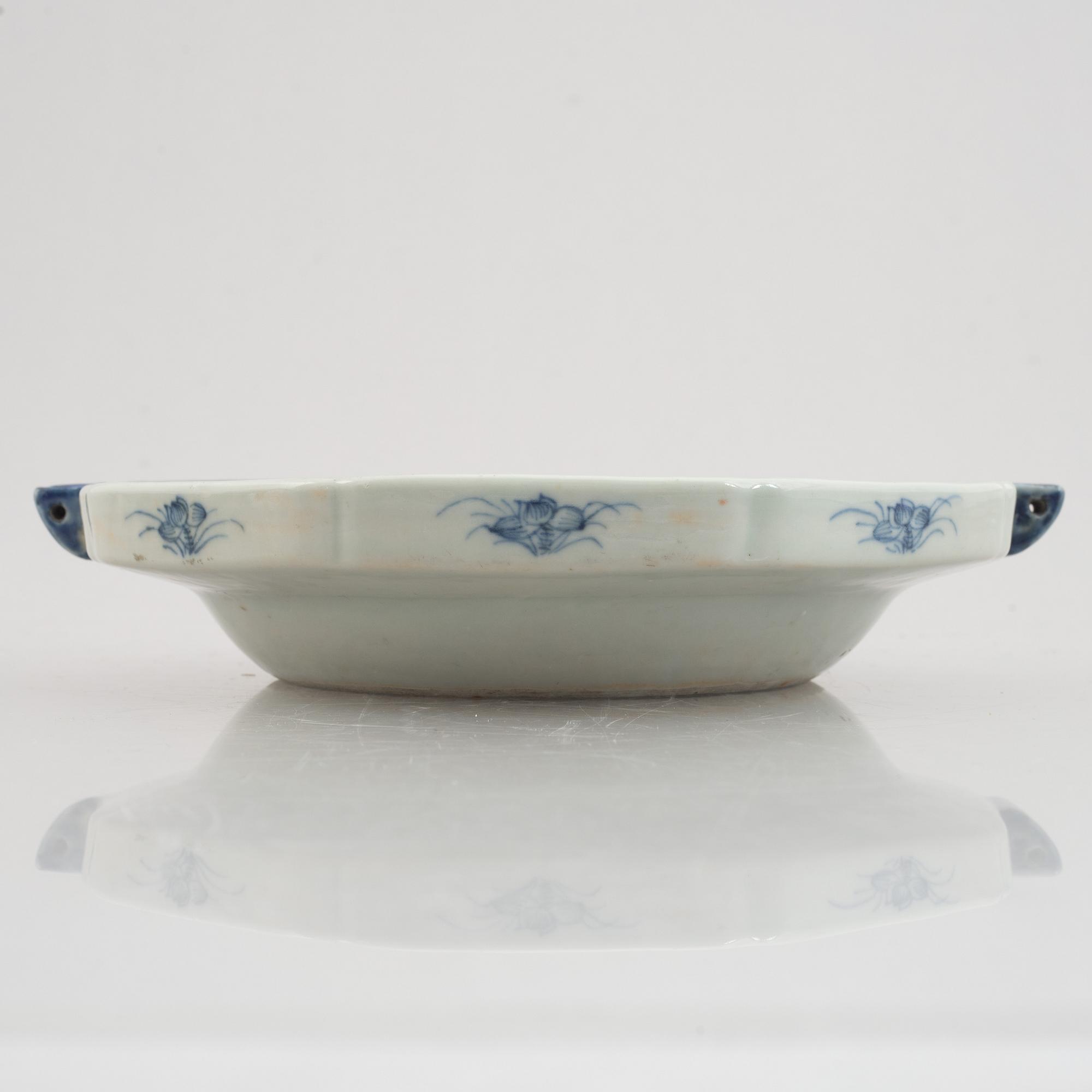 A blue and white warm water plate, a low bowl and a serving dish, China, Qing dynasty, 18th-19th century.